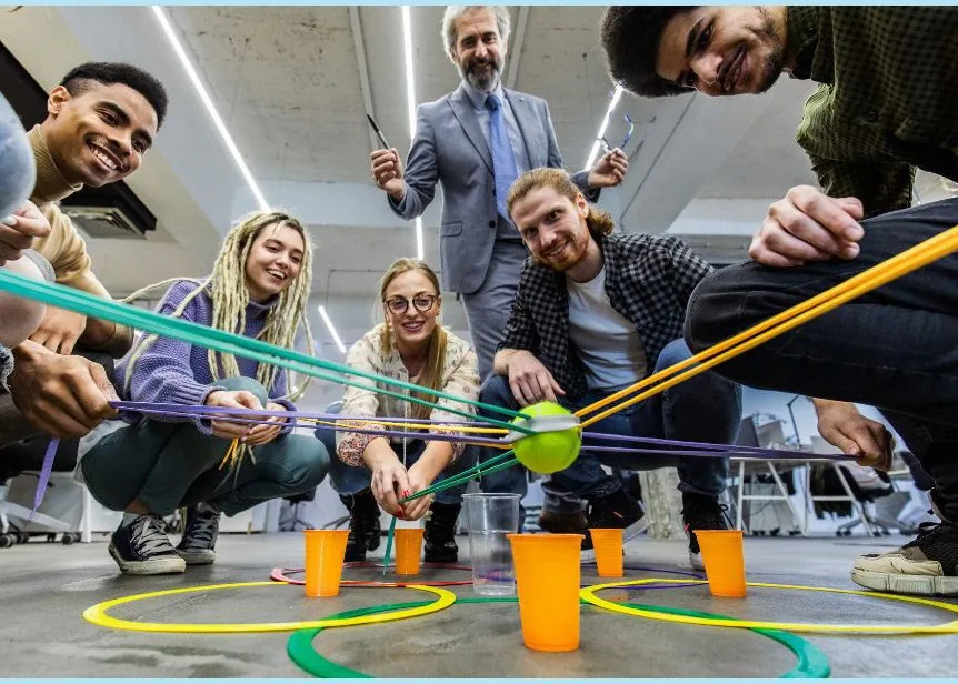 Team members collaborating during a team-building experience